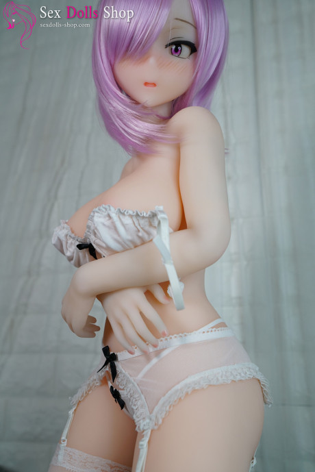 Purple-haired gigantic sex doll Akane B strips and shows her curvy body