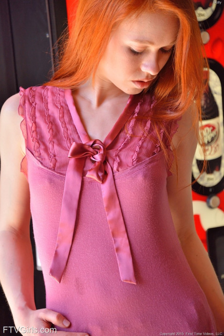 Pretty redhead schoolgirl Dolly stuffing beads into her fresh gaping vagina