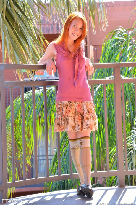 Pretty redhead schoolgirl Dolly stuffing beads into her fresh gaping vagina