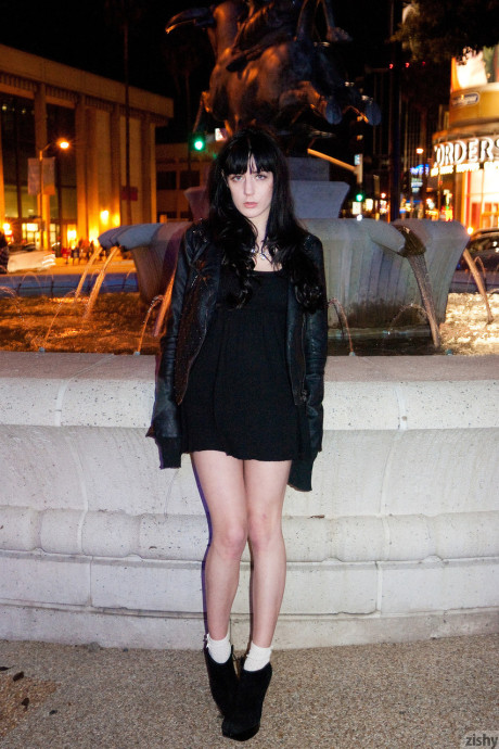 British Samantha Bentley with black hair, ebony leggings and lovely pink bow