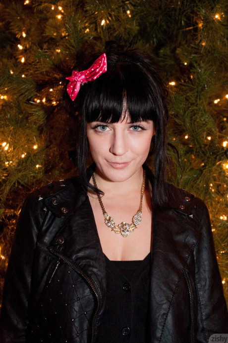 British Samantha Bentley with black hair, ebony leggings and lovely pink bow