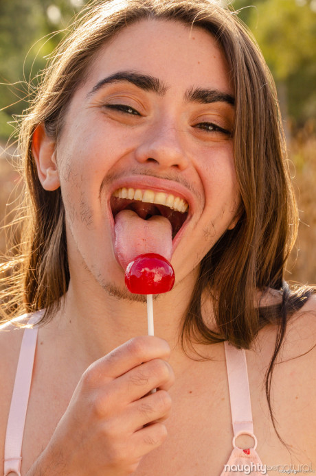 Stunning pretty amateur Kisa Fae shows off her incredibly furry vagina outdoors