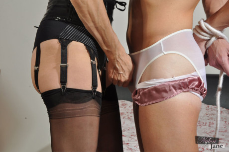 Hot mature mistress Nylon Jane binds her slave & tortures him with her tongue