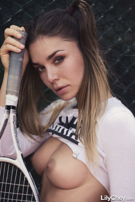 Lovely Ukrainian tennis player Lily Chey strips to her panties on the court