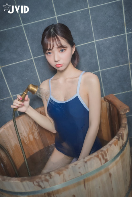 Japanese coed flashes her ebony panties while wearing her glasses