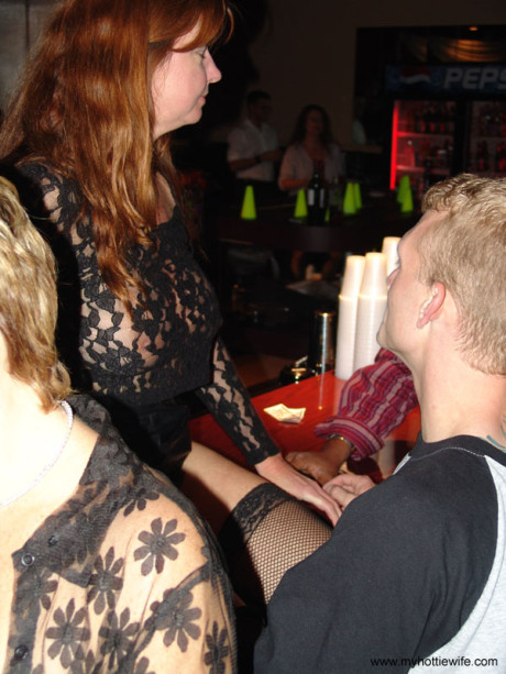 Sweet redheaded older Double Dee gets nasty in a fine skirt at a club