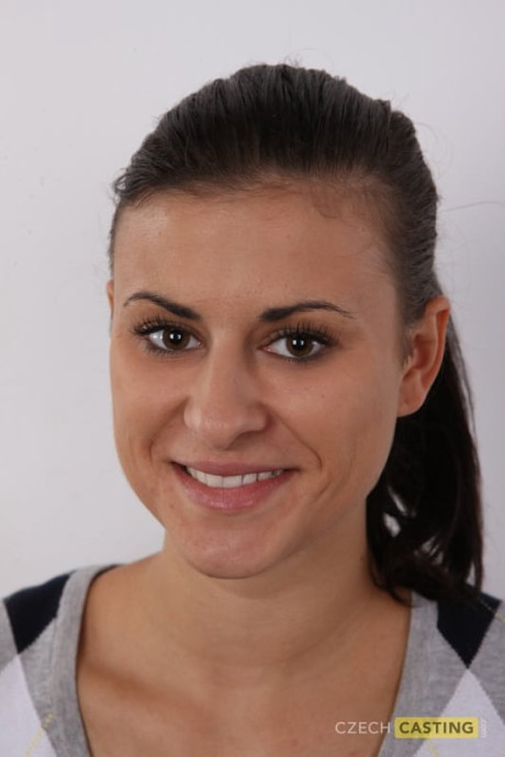 Brunette amateur removes leggings and underwear to stand undressed in a ponytail