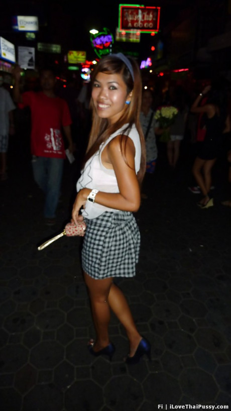 Nasty asian babe in mini skirt gives a blowjob and gets nailed