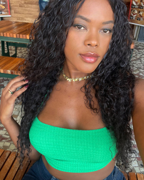 Ravishing black babe shows off her enormous butt & her ravishing titties in undies