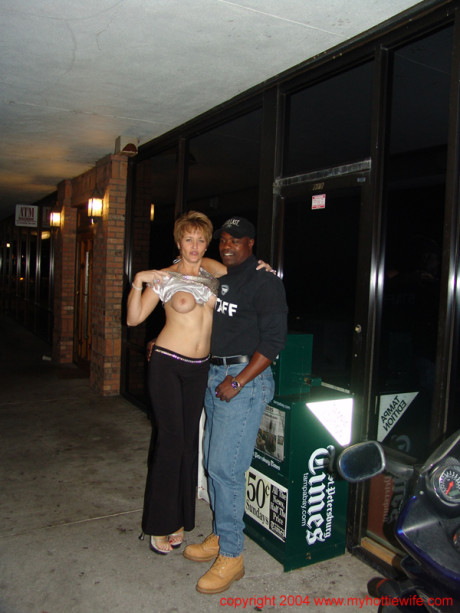Naughty cougar American wives reveal their massive melons at a swingers party
