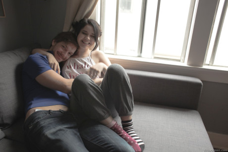 Dark haired young Yhivi exposing bushy twat and anus in socks