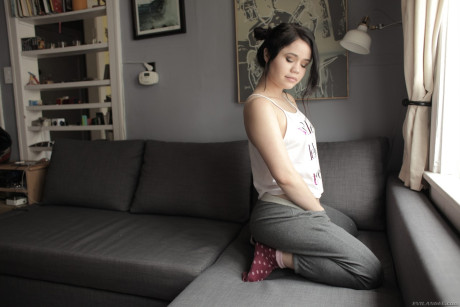 Dark haired young Yhivi exposing bushy twat and anus in socks