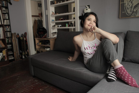 Dark haired young Yhivi exposing bushy twat and anus in socks