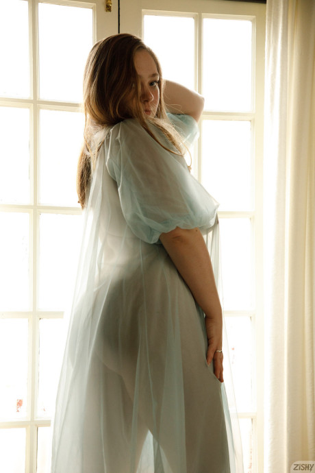 Adorable babe Rose Fessenden shows off her chubby body in see-through undies