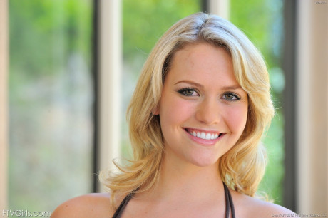 Young sweety with blondie hair changes into a short dress for public flashing