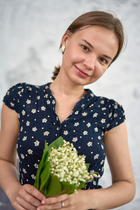 Adorable young Yenn Cat reveals her attractive delicious titties and poses naked in a solo