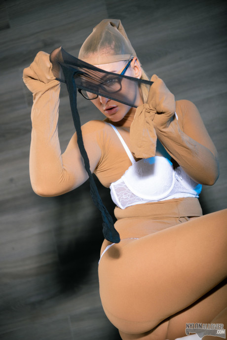 Nerdy white skank girlfriend girl Naomi Bennet covers herself in layers of nylons