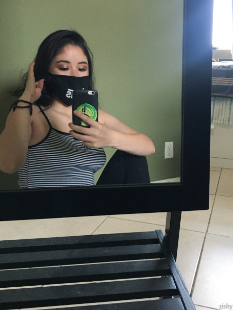 Fine brunette shows off her beautiful huge melons in hot quarantine self shots
