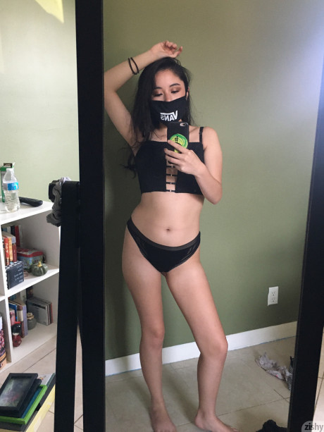 Fine brunette shows off her beautiful huge melons in hot quarantine self shots