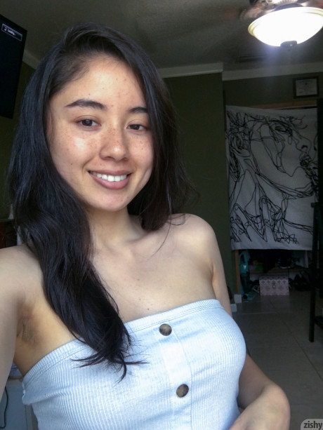 Fine brunette shows off her beautiful huge melons in hot quarantine self shots