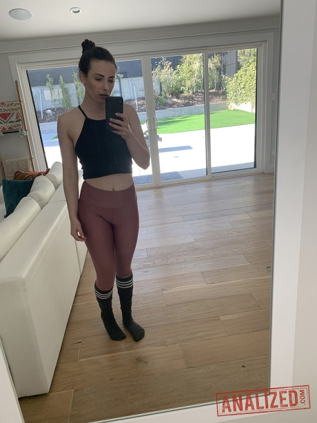 Hot brunette Casey Calvert fingers her tiny butthole while flaunting her great behind