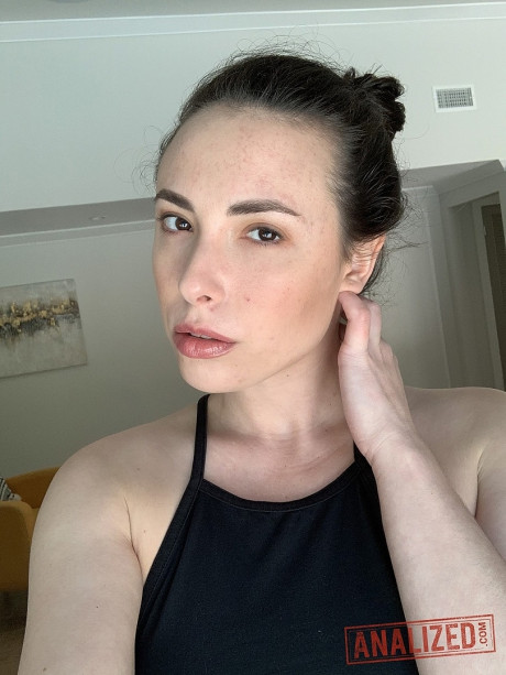 Hot brunette Casey Calvert fingers her tiny butthole while flaunting her great behind