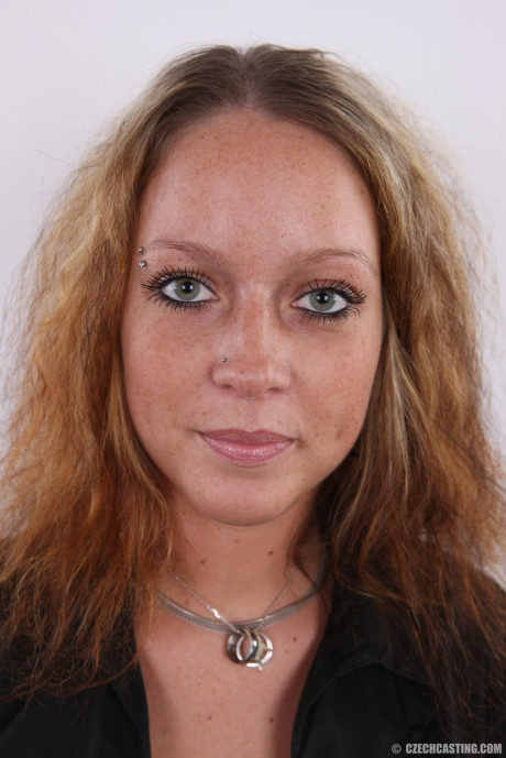 First timer puts the focus on her natural breasts and giant areolas once she's undressed