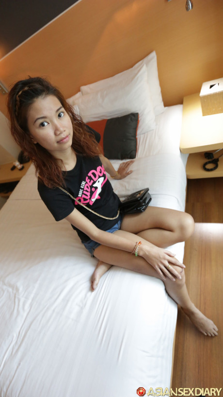 Slender oriental babe Oay B unveils her hairy pussy and gets slammed in POV