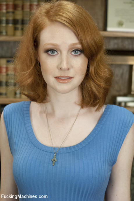 Natural red hair masturbates while being screwed by a machine dildo
