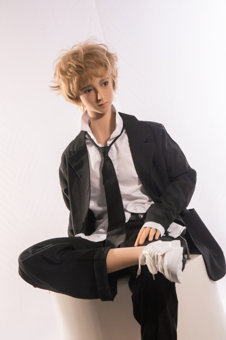 Little yellow-haired male sex doll Ming strips off his suit & displays his stiff schlong
