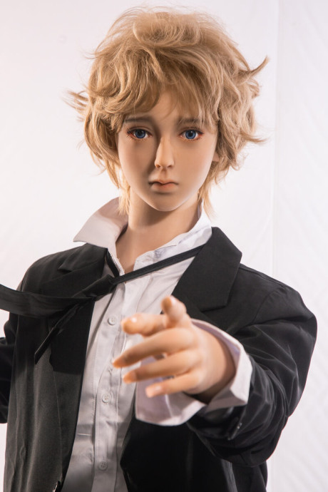Little yellow-haired male sex doll Ming strips off his suit & displays his stiff schlong