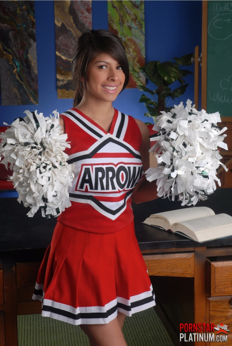 Adorable cheerleder Layla Rose reveals her humongous tits and fingers her twat