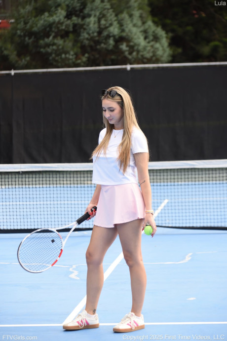 Very lovely young tennis babe Lula shows her boobies and thick booty in a BDSM outfit