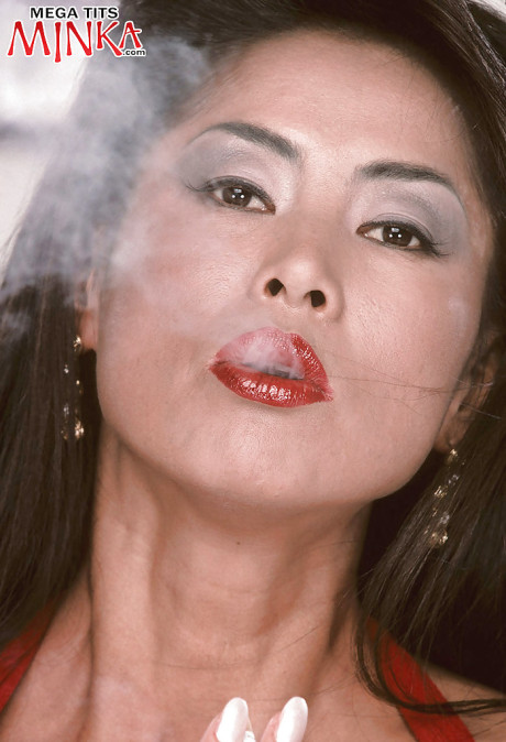 Old chinese babe Minka flaunting monster breasts and spreading silky snatch