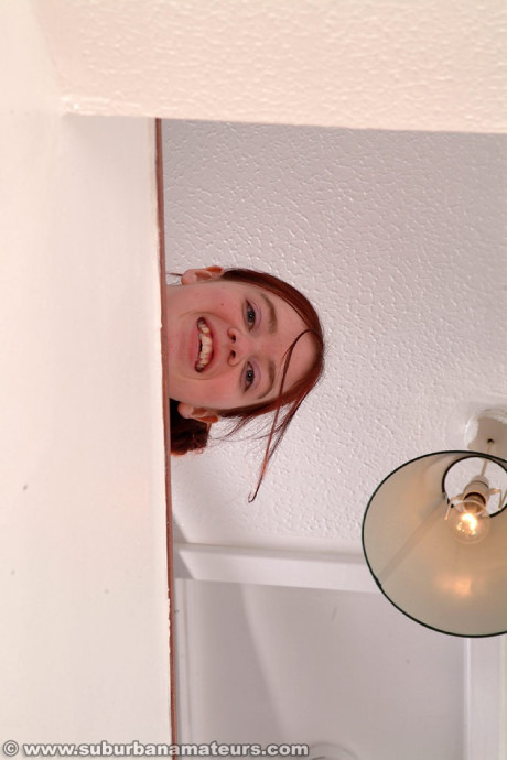 British amateur Sadie strips undressed on the stairs and toys her bushy twat