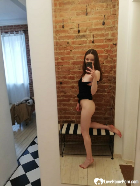Skinny amateur teenie posing naked and in her cute dress in the mirror