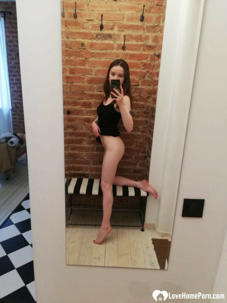 Skinny amateur teenie posing naked and in her cute dress in the mirror
