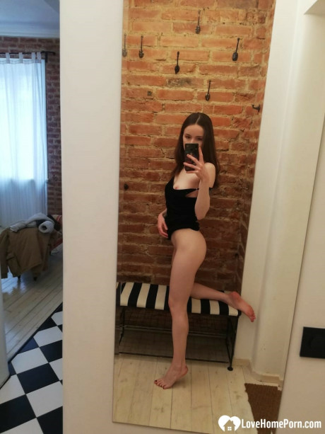 Skinny amateur teenie posing naked and in her cute dress in the mirror