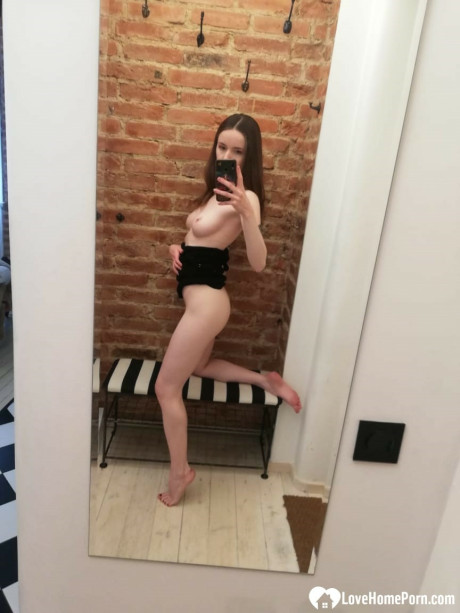 Skinny amateur teenie posing naked and in her cute dress in the mirror