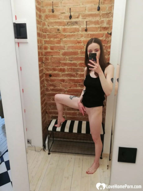 Skinny amateur teenie posing naked and in her cute dress in the mirror