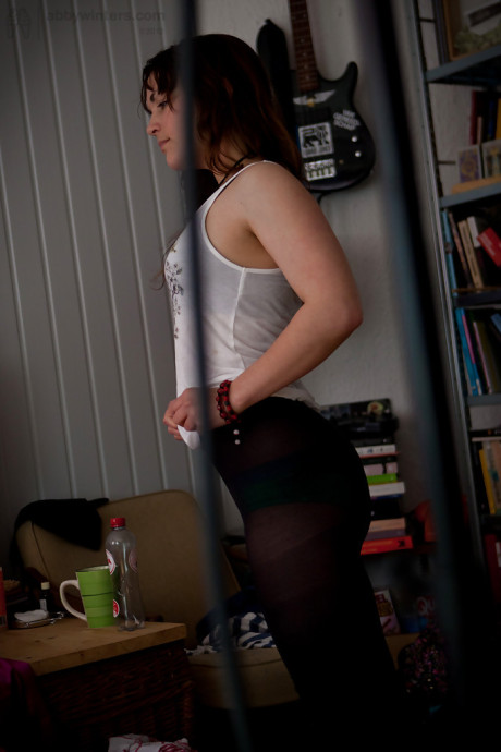 Dirty voyeur shots of fresh teenie babe Bea getting dressed after undressed modelling