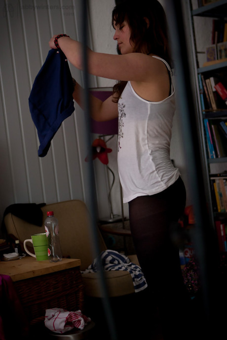 Dirty voyeur shots of fresh teenie babe Bea getting dressed after undressed modelling