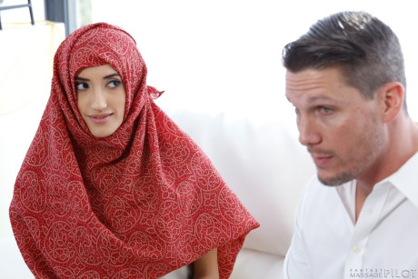 Hijab wearing babe and her dark haired friend getting horny with hot lover