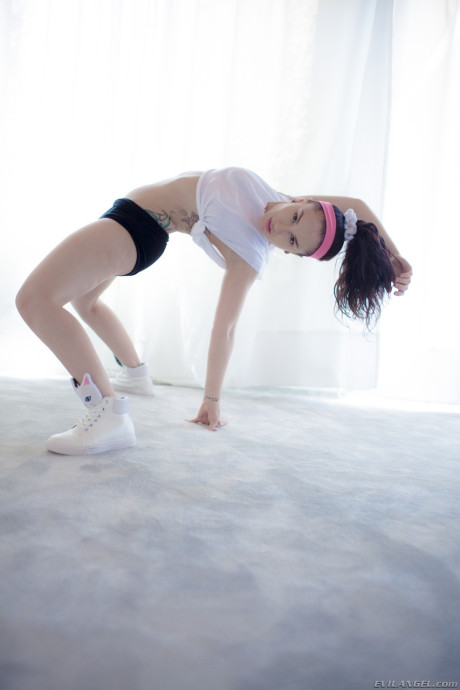 Short brunette Gabriella Paltrova bends over and shows her charming ass
