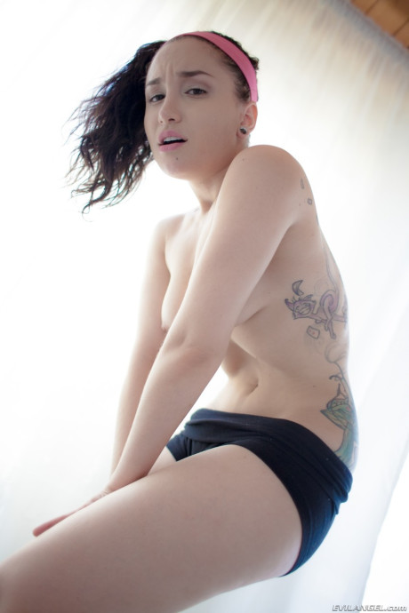 Short brunette Gabriella Paltrova bends over and shows her charming ass