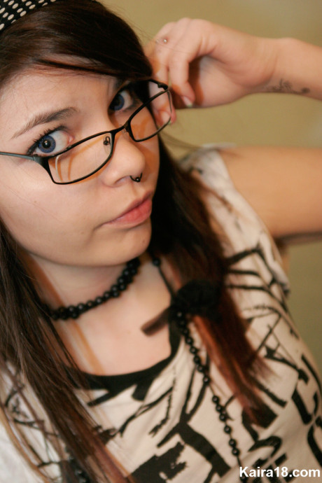 Barely legal young Kaira 18 takes her glasses off while modeling non undressed