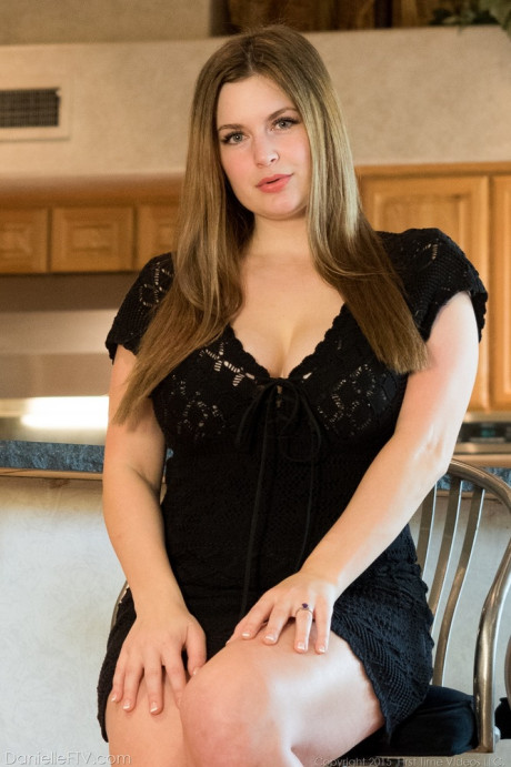 Chubby first timer lifts up her ebony dress to expose vagina and bare ass
