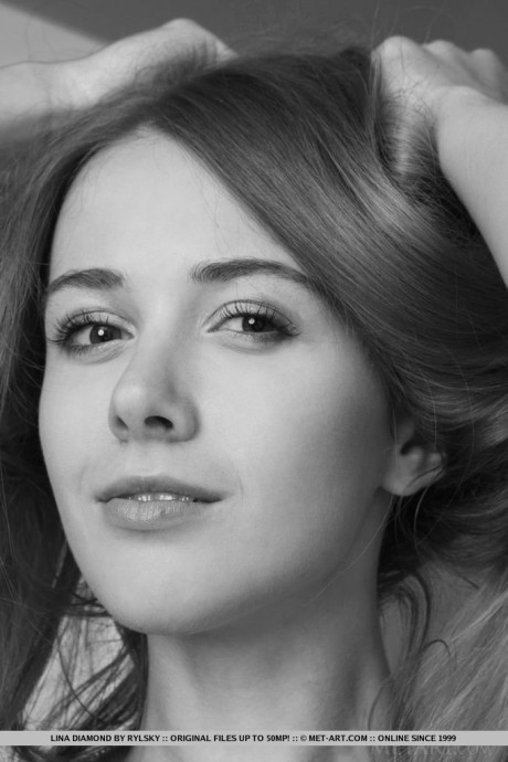 Slim brunette doll Lina removes her short dress to uncover her snatch