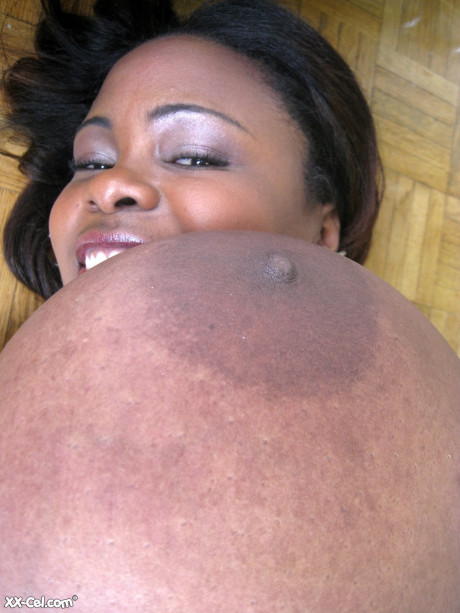 Ebony wifey Miosotis Claribel strips and exposes her tremendous tits