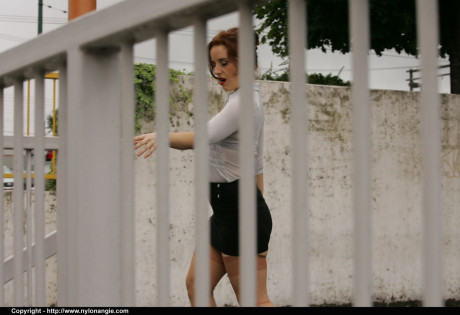 Old girl slutty Angie takes a piss outdoors in retro nylons